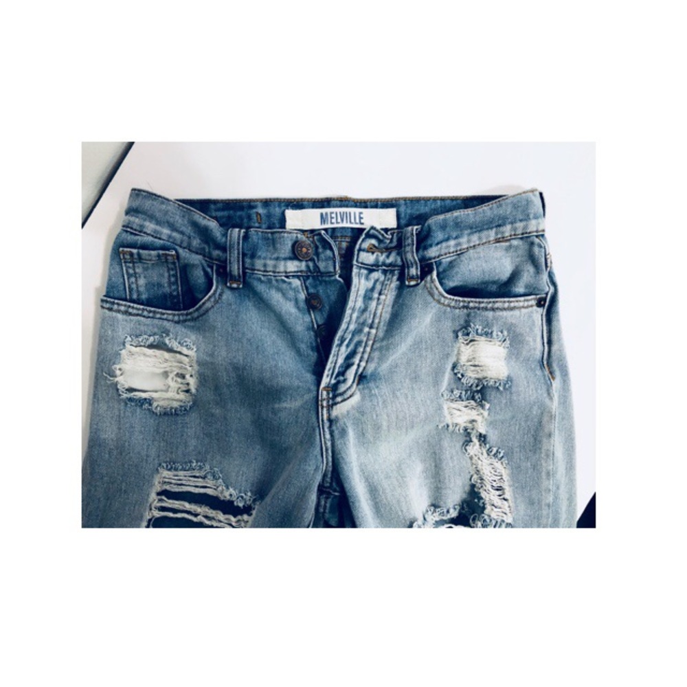 Brandy Melville distresses boyfriend jeans